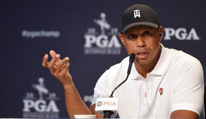 May 14, 2019; Farmingdale, NY, USA; Tiger Woods addresses the media during a press conference before the PGA Championship golf tournament at Bethpage State Park - Black Course. Mandatory Credit: John David Mercer-USA TODAY Sports